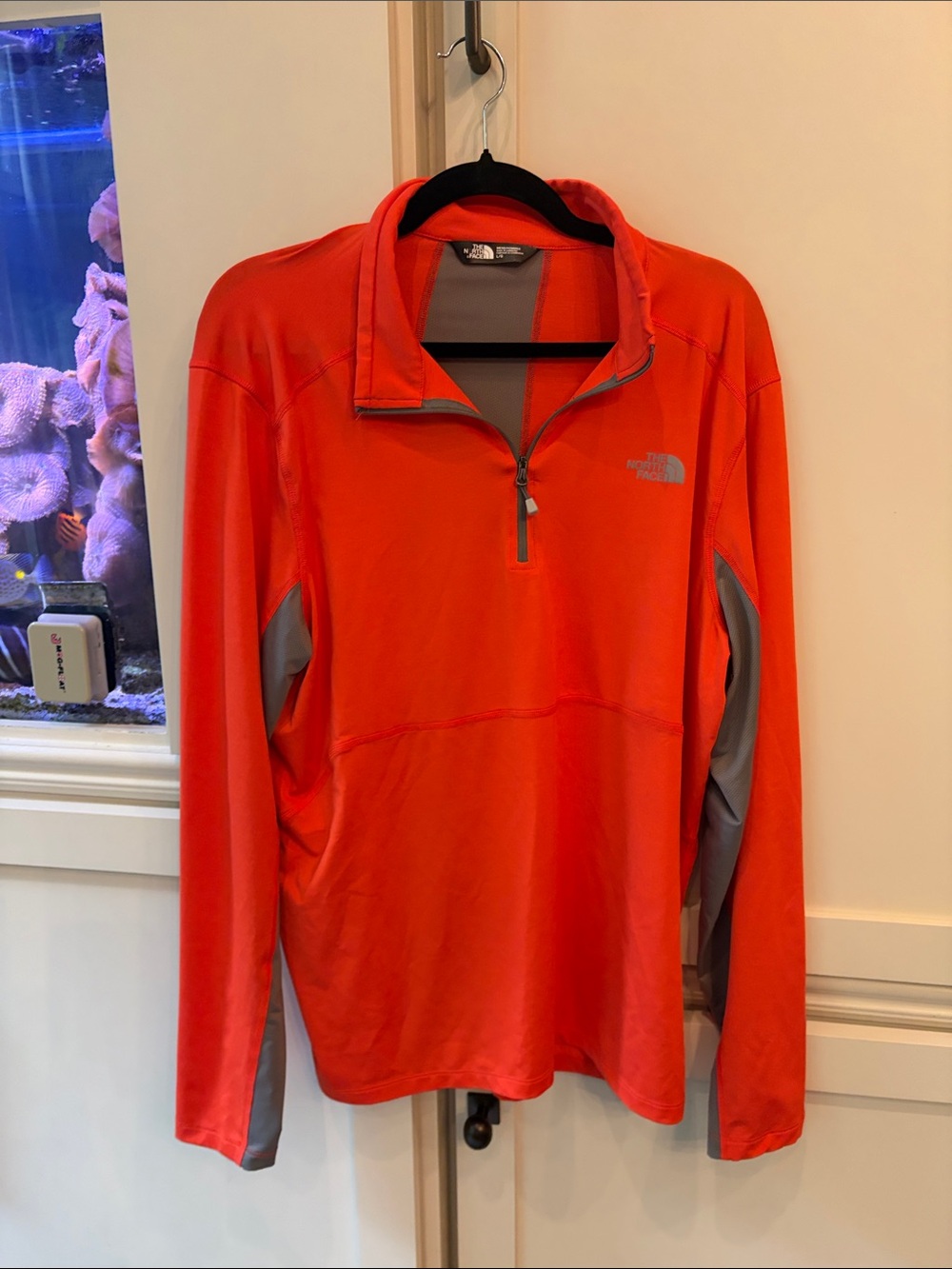 The North Face Men’s Orange Half-Zip Performance Pullover with Gray Panels